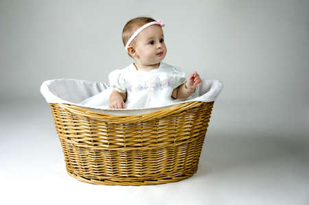 Baby Girl in Basketの写真素材