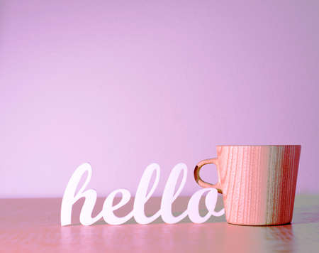 Hello with Wooden Mugの写真素材