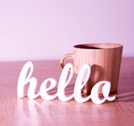 Hello with Wooden Mugの写真素材