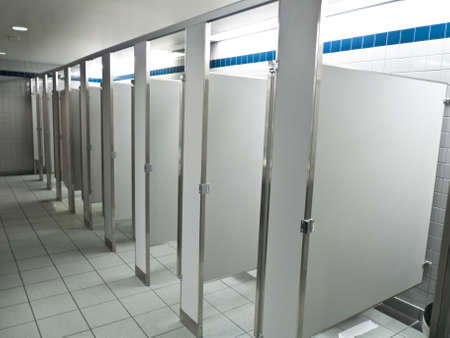 Row of new public bathroom stallsの写真素材