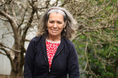 Energetic smiling mature womanの写真素材