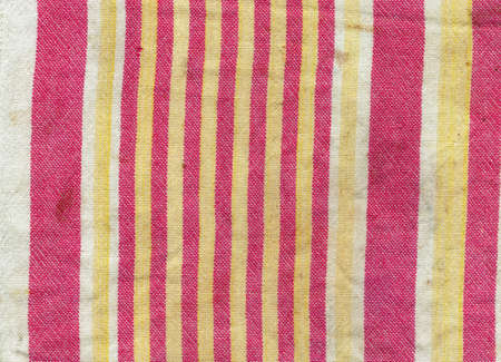 Old dirty dishcloth with stripes. Background.の写真素材