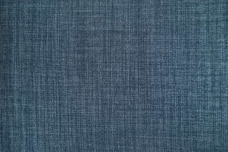 The texture of gray cloth macro for the background and wallpaper.