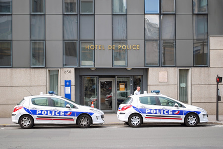 Paris, France, 22 June: Police Department with two police cars on the Rue de Vaugirard June 22, 2012 in Paris.のeditorial素材