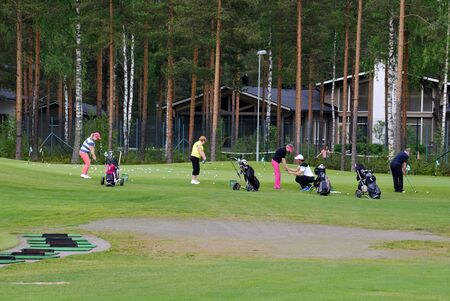 VIERUMAKI, FINLAND, June 23: Golf Players hold training session at the sports centre for the game of Golf Vierumaki, one of the most favorite in Finland, places for recreation and sports, June 23, 2015.のeditorial素材