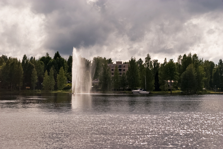Artificial fountain on the water surface in the Finnish town of Heinola.の写真素材