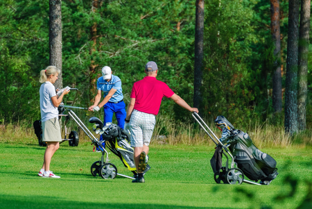 VIERUMAKI, FINLAND, August 22: Golf lovers are discussing another blow to the ball - Vierumaki, Finland, August 22, 2016.のeditorial素材