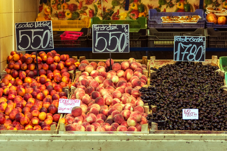 Counter with fruit and price tag in the Central market in Budapest.の写真素材
