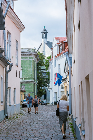 Tallinn, Estonia, August 10: Tourists walk through the narrow streets of Old Tallinn, August 10, 2017.のeditorial素材