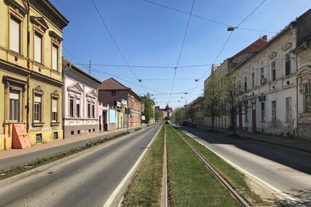 Szeged, Hungary, April 11: View of a deserted street during a coronavirus quarantine in the city of...