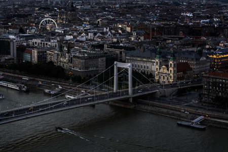 View of the eastern part of the city of Budapest and the Erzsebet bridge from Gellert mountain,...