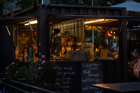 Dresden, Germany, August 5. A view of an outdoor cafe in the late evening on one of the streets in...