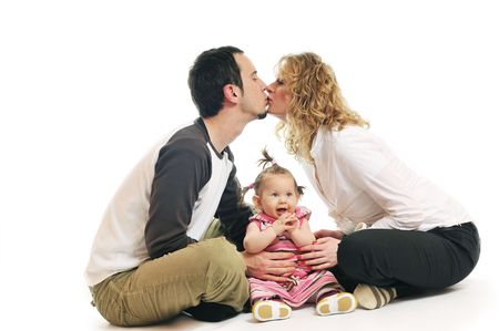 young happy family with beautiful baby isolated on whiteの写真素材