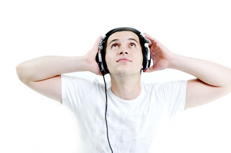 young dj man with headphones and compact disc dj equipmentの写真素材