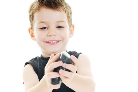 happy kid play on floor isolated on whiteの写真素材