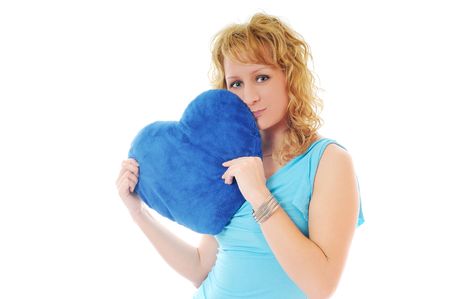 happy young woman with heart isolated on whiteの写真素材