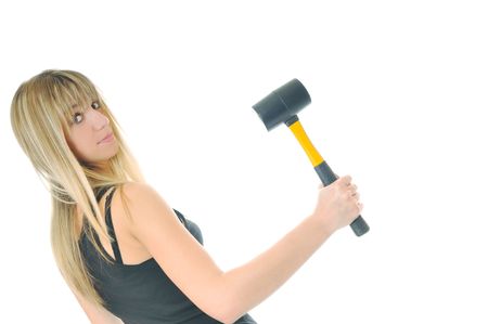 woman with hammer isolated on whiteの写真素材