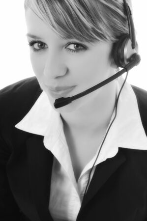 young beautiful business woman with headset phone help customer solution info serviceの写真素材