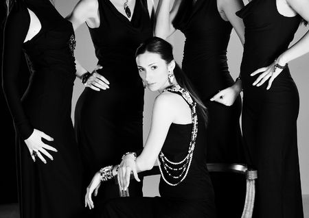 beautiful woman on fashion show piste with gold jawelの写真素材