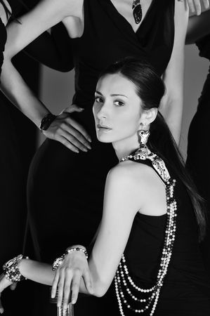beautiful woman on fashion show piste with gold jawelの写真素材
