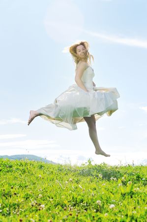 happy young beautiful bride after wedding ceremony event have fun の写真素材