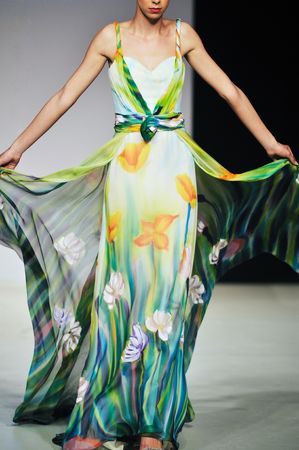 fashion show woman at piste walkinx in luxury dressの写真素材