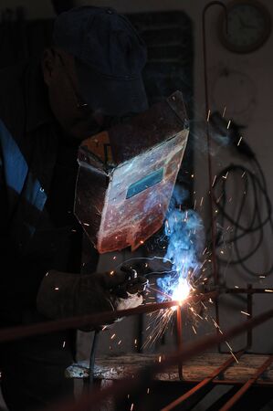 weld machine worker hard industry businessの写真素材
