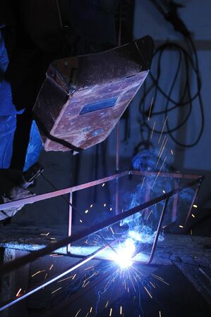 weld machine worker hard industry businessの写真素材