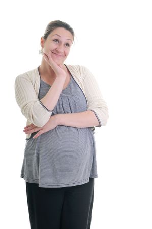 one happy pregnant woman smile isolated on white in studioの写真素材