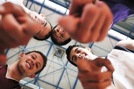 basket ball players team portrait in hi-school sport gym