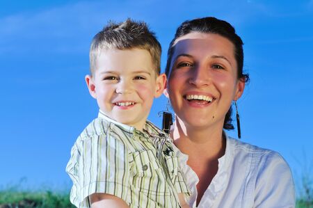 happy young woman mother play and outdoor with beautiful child 