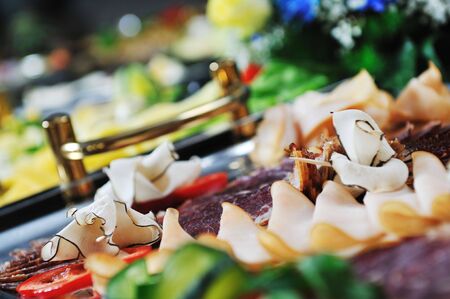 buffet catering food arangement on tableの写真素材