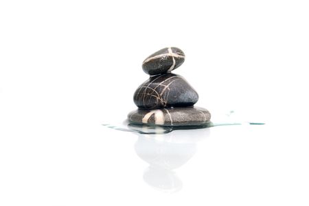 isolated  zen stones on whiteの写真素材