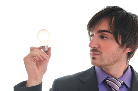 one business man isolated on white hold bul with idea and inovation conceptの写真素材