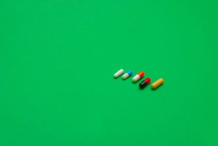 pills on green background