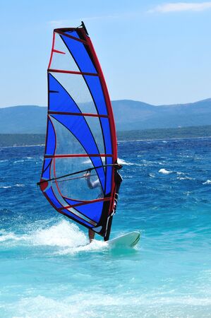 man wind sirfing and have healthy lifestyle の写真素材