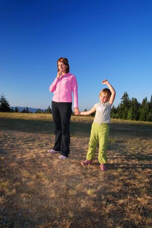 happy mother and daughter in natureの写真素材