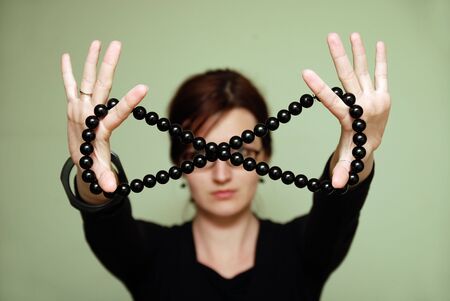 Female with black pearlsの写真素材