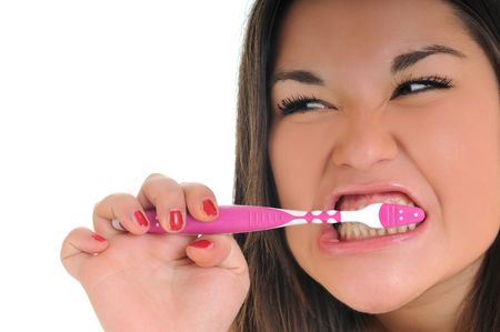 dental care concept with beautiful smilling young  woman and tooth brushの写真素材