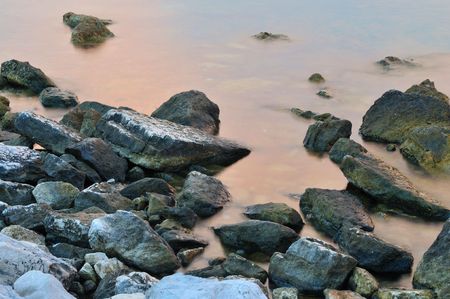 sea rock with long exposure representing a peace and harmony conceptの写真素材