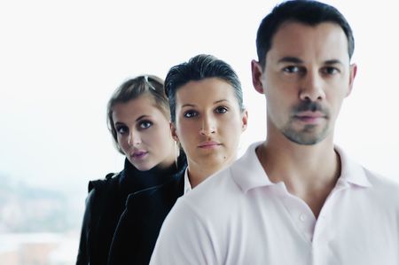 business people group together standing indoor and representing team and teamwork conceptの写真素材