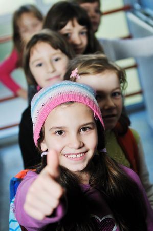 happy childrens group in schoold have fun and learning leassos