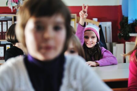 happy childrens group in schoold have fun and learning leassos