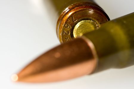 happy young business woman isolated on white playing with dollars money and representing success in financeの写真素材