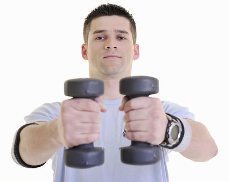 young man exercise fitness sport and strech isolated on white in studioの写真素材