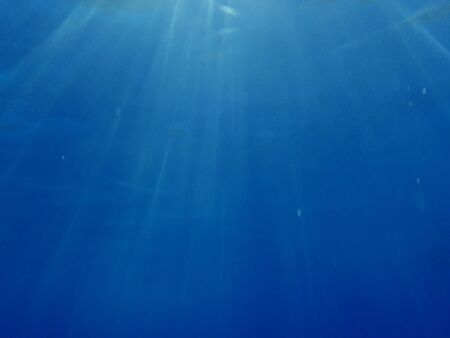 blue underwater background with water air bubbles の写真素材
