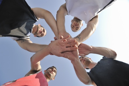 basketball player team group  posing on streetbal court at the city on early morningの写真素材