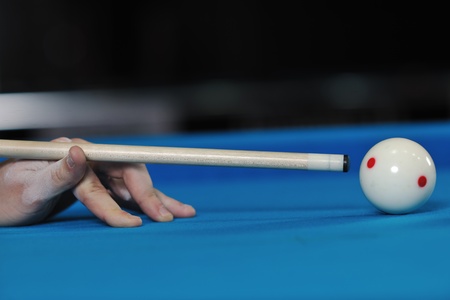 young pro billiard player finding best solution and right angle at billard or snooker pool sport  game の写真素材
