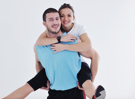 happy young couple fitness workout and fun at sport gym clubの写真素材