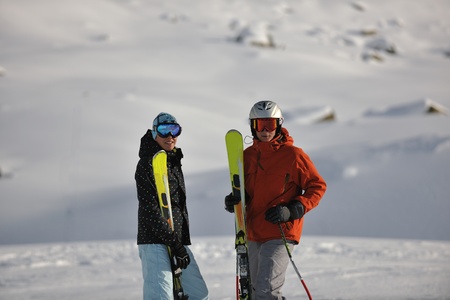 young athlete man have fun during skiing sport on hi mountain slopes at winter seasson and sunny dayの写真素材